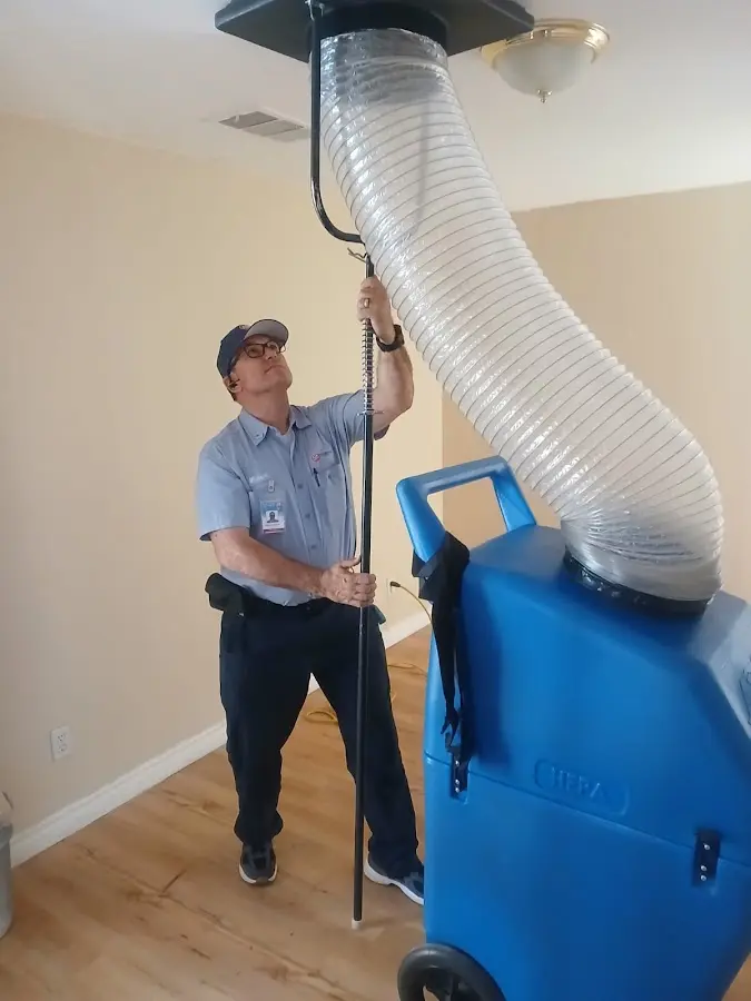 HVAC Installation technician using HEPA equipment in Waller